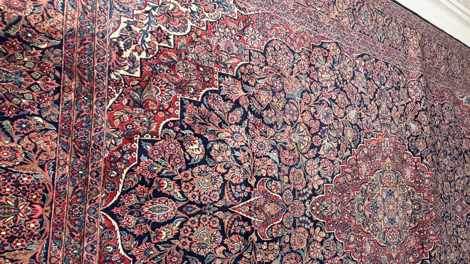 A hand-knotted Kashan laid out full