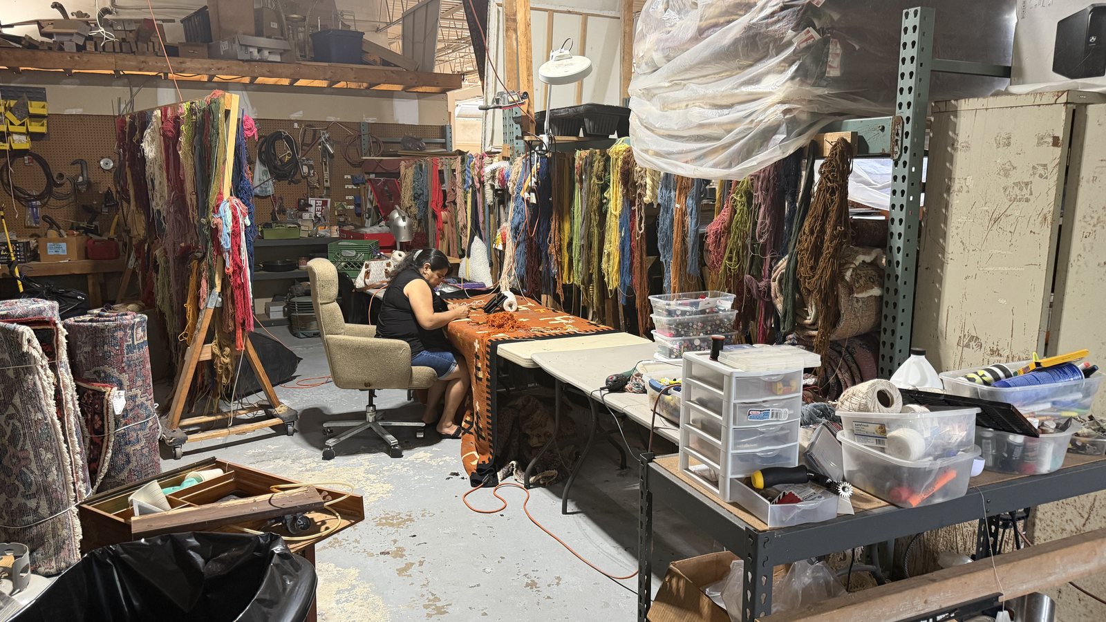 A rug on the wash floor at the workshop